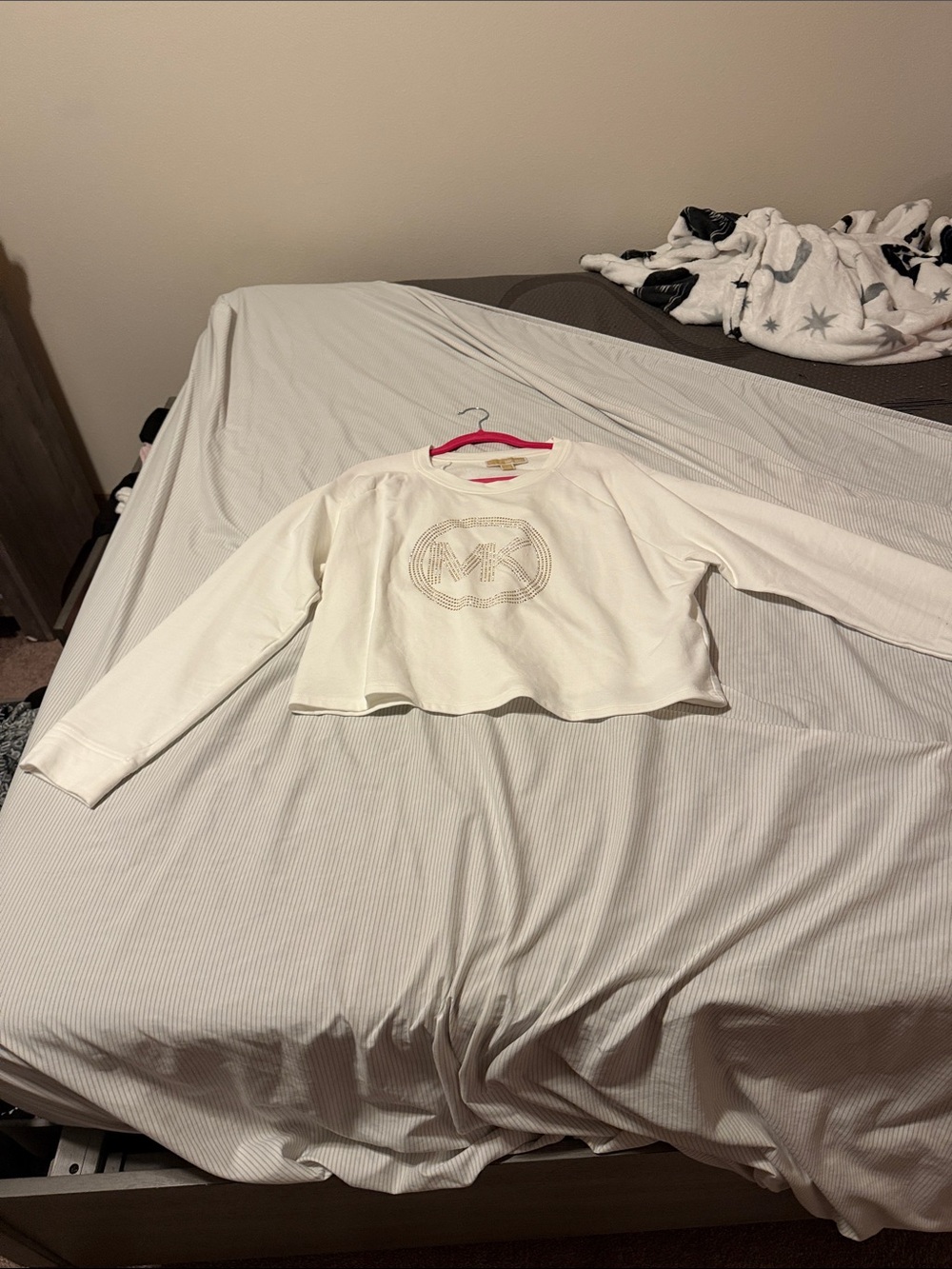 Michael Kors sweater mix crop top at the bottom of it